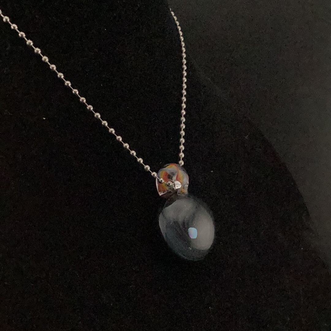 Opal encasement pendant