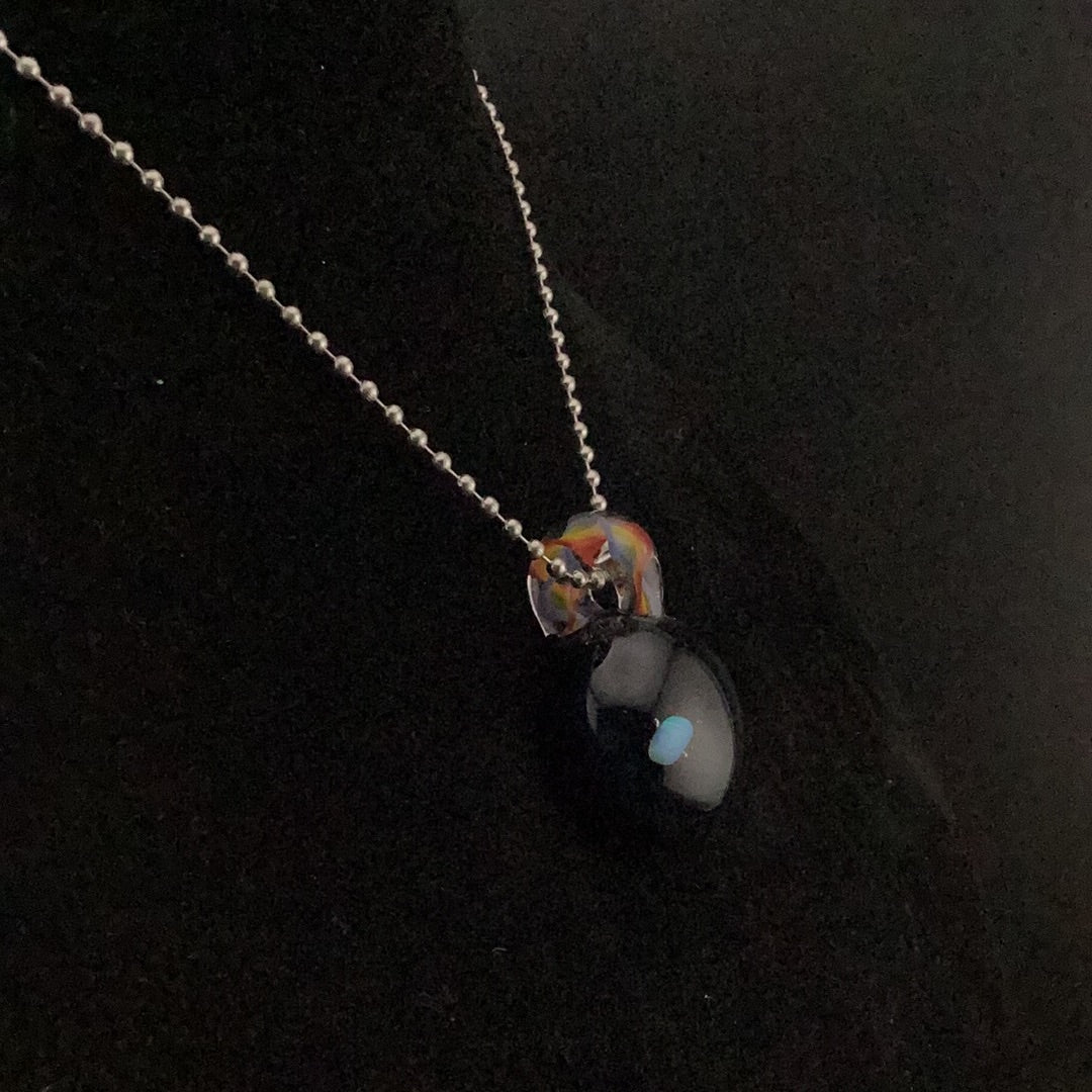 Opal encasement pendant