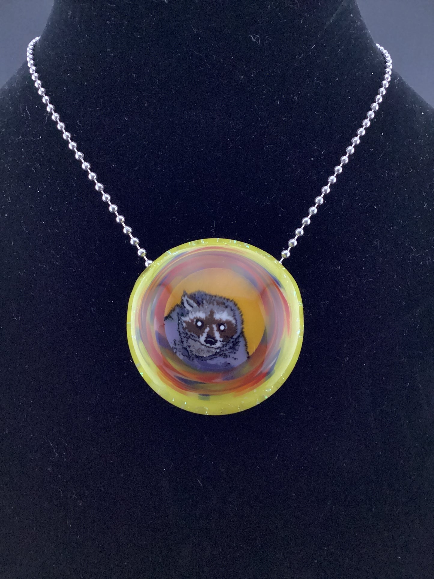 Sleepy raccoon hollow mille pendant