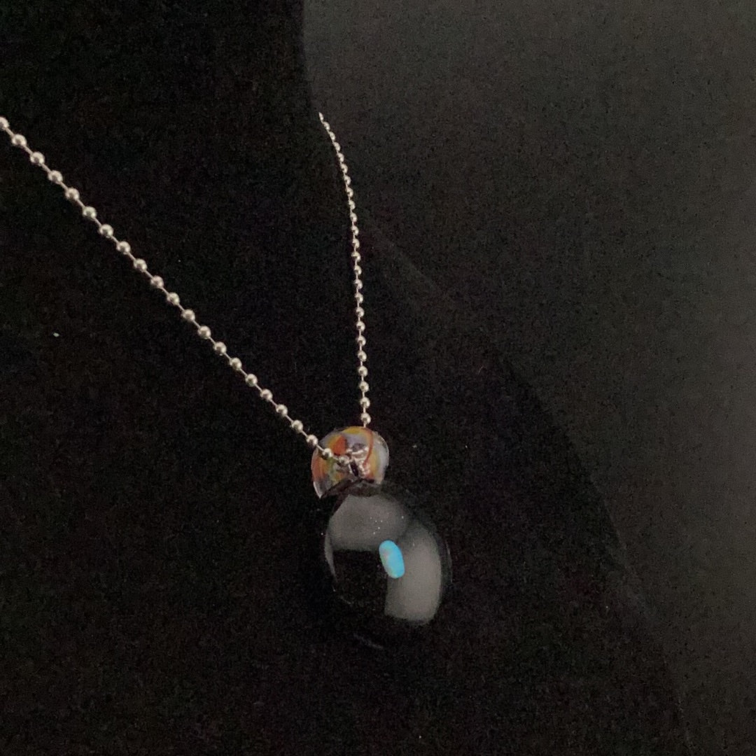 Opal encasement pendant