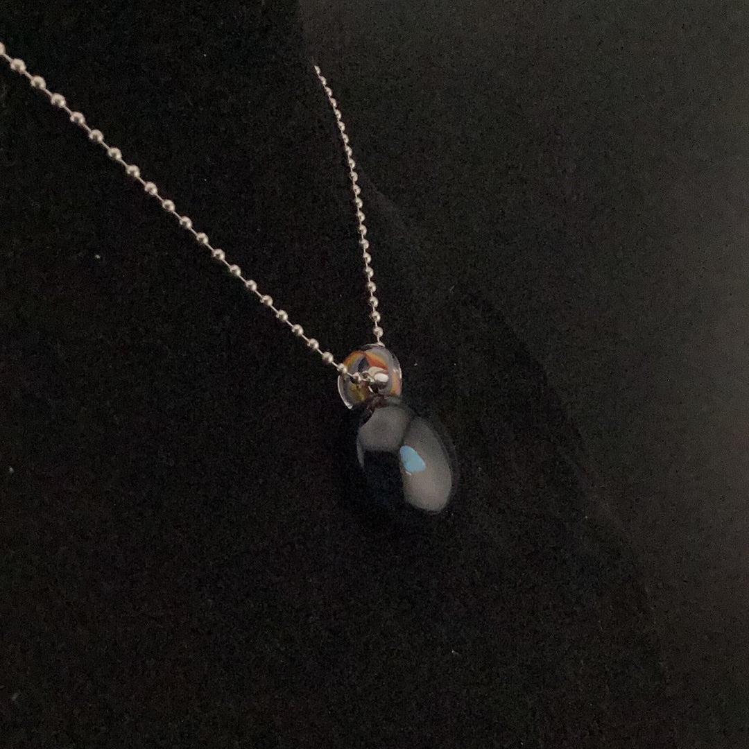 Opal encasement pendant