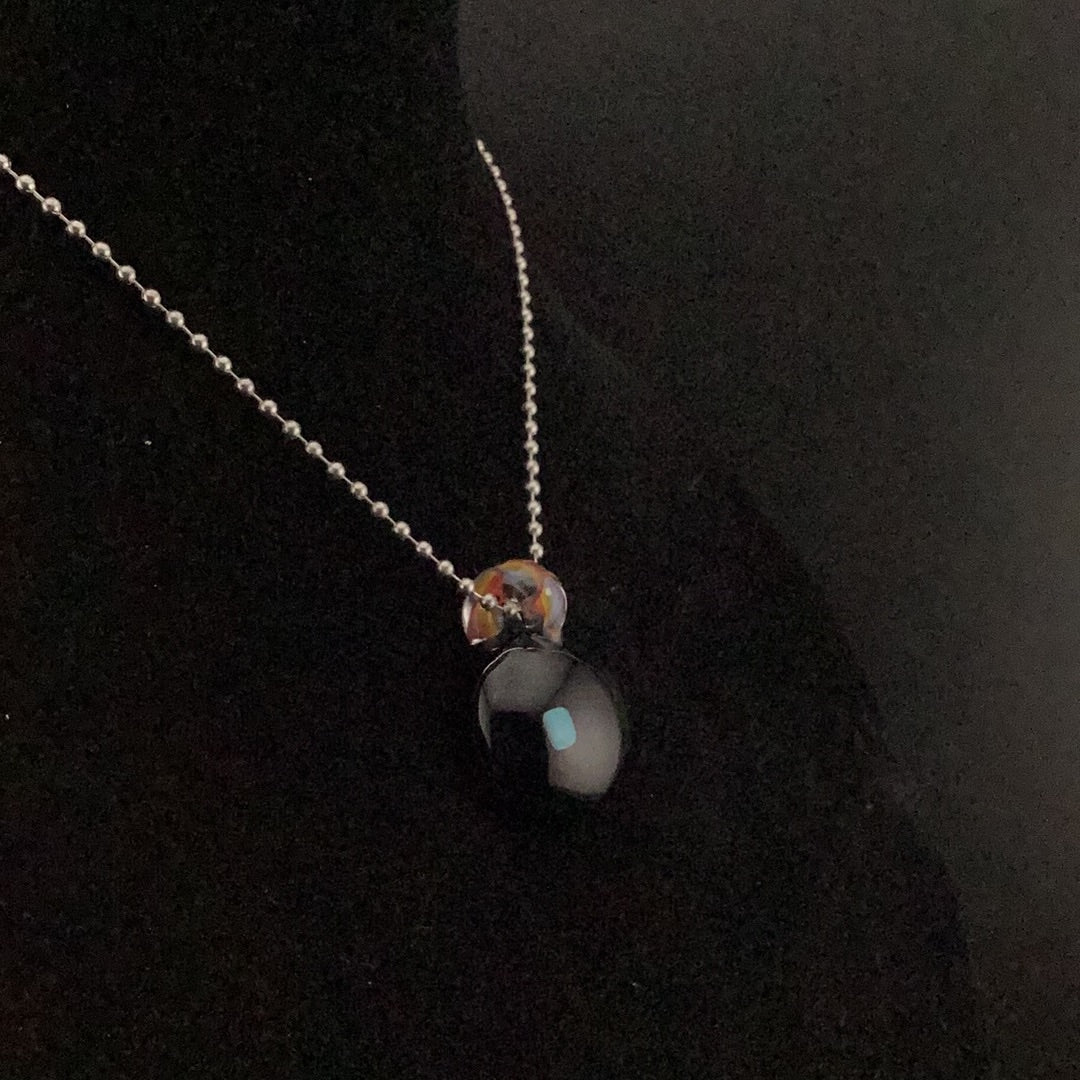 Opal encasement pendant